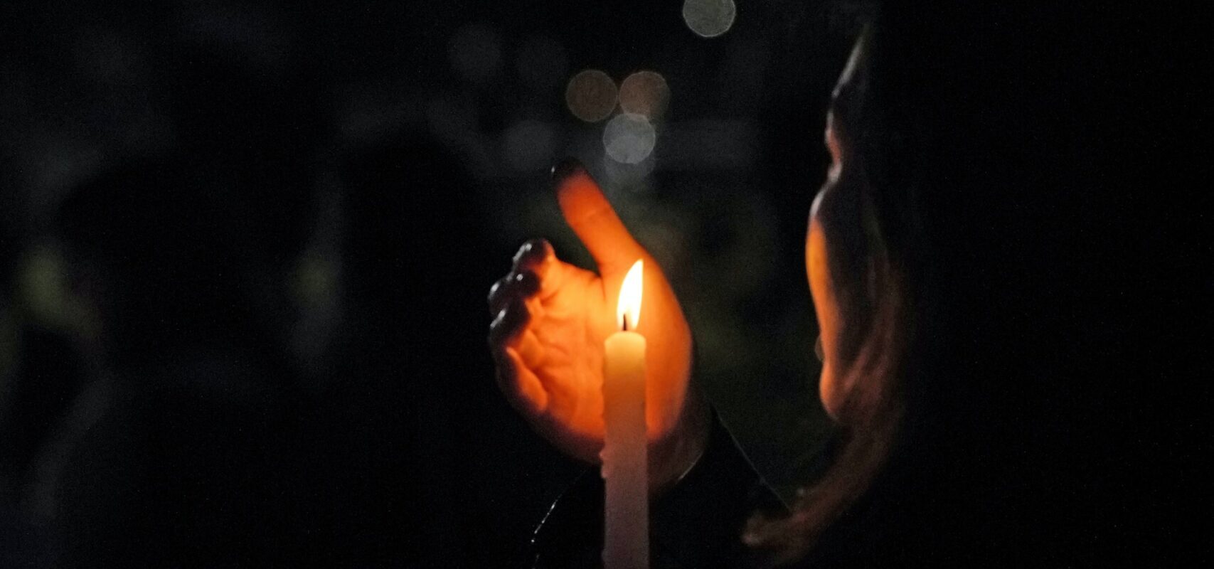 lady holding candle