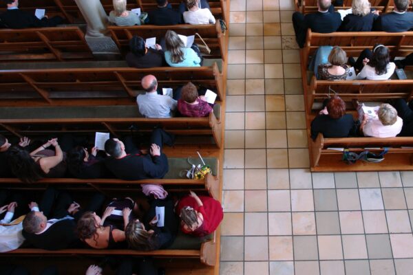 Congregation at church praying