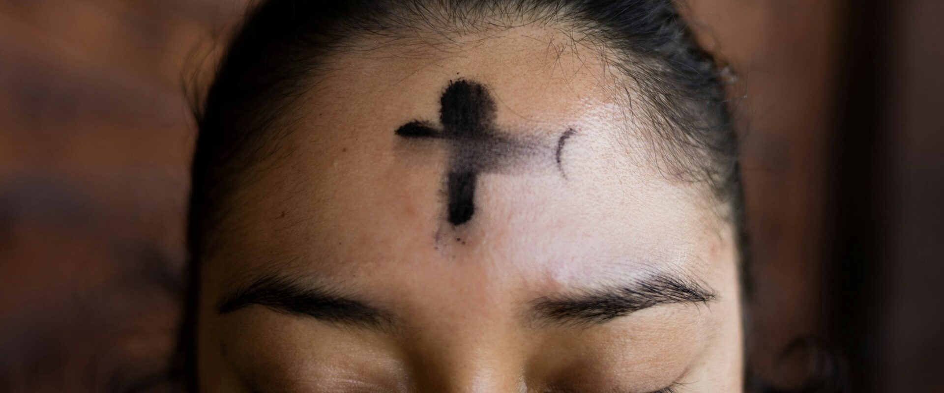 Ashing service with ash cross on forehead