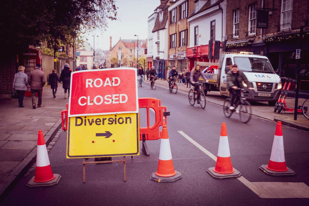 Road closed with diversion signs