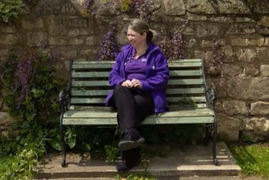 Parish nurse on park bench